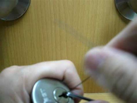 To find the seized pin, start near the outside of the lock and press up on each pin one at a time, inserting the pick further and further into the lock as you go. Pick a deadbolt door lock with bobby pins - YouTube