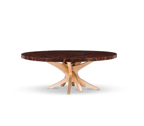 Jacques game table also doubles as a petite dining table. Dining Room Projects by Jonathan Adler | Modern Home Decor