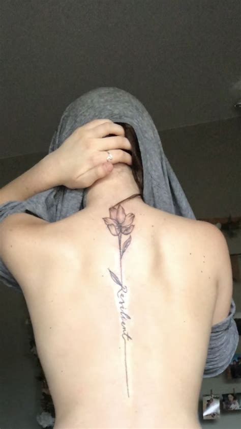 You could choose to get a unique small tattoo in the upper back if not ready for a spine tattoo. #spinetattoos #tattoos #delicate #flowertattoo #flowers # ...