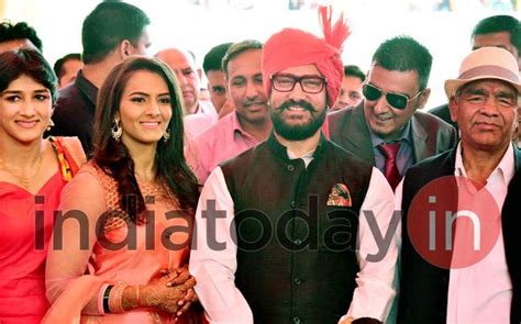 Geeta phogat posing with father mahavir, sister babita and. Aamir at Geeta Phogat wedding: All my money is in the bank ...