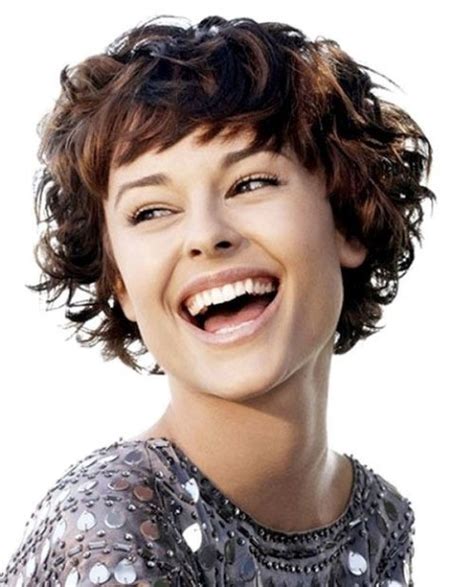 This short haircut is a lovely, hazelnut shade with lighter balayage and darker shading highlighting textured layers. 21 Lively Short Haircuts for Curly Hair | Styles Weekly