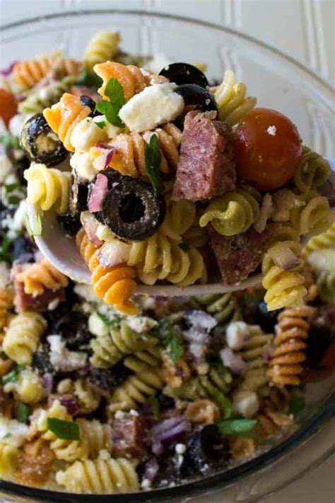 The cold pasta salad itself and the homemade italian dressing it's coated in. Italian Pasta Salad with Pepperoni | A Wicked Whisk