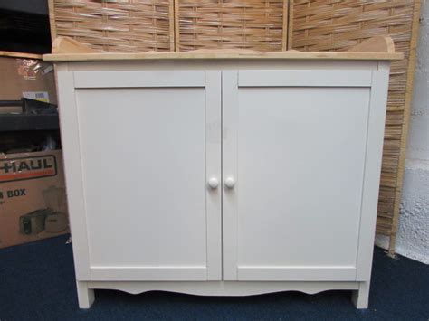 Full overlay doors and drawer fronts. Lot Detail - WHITE CABINET WITH WOOD TOP