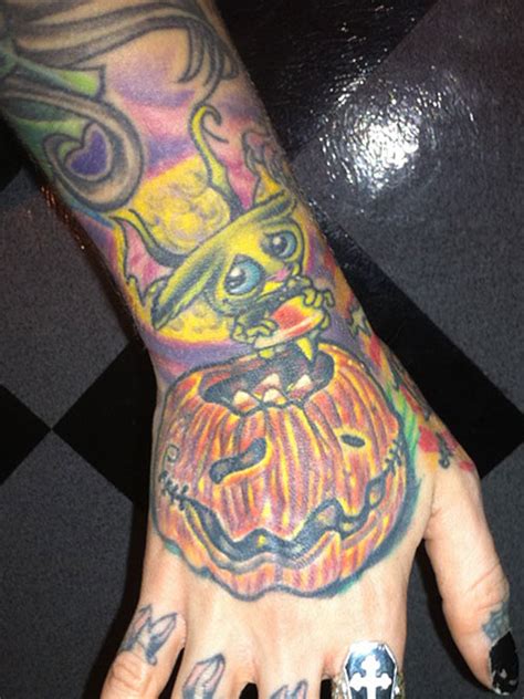 :hand poked moon phase tattoos on the upper back. Megan Massacre Bat, Candy, Pumpkin Back of Hand Tattoo ...