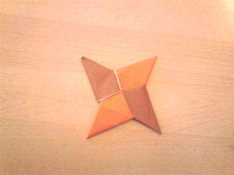 Flowers are collected quite easily and quickly, and look very impressive and origami flowers also look good on decorative panels, applications and in gifts. Origami Shuriken · How To Fold An Origami Shape · Paper ...