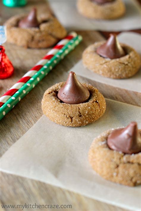 Chewy gingerbread blossom cookies rolled in sugar with chocolate hershey kiss centers. Hershey Kiss Gingerbread Cookies - Tips for making hershey ...