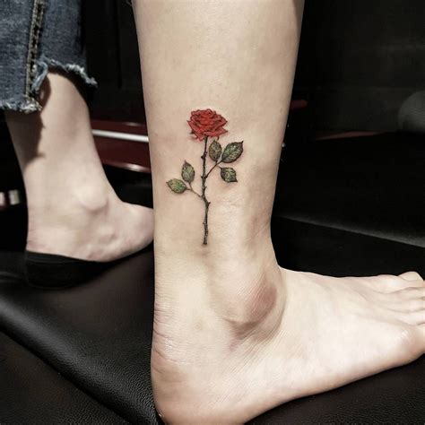 Excited because we're always looking for another tiny tattoo to add to our collection and sad because we are seriously running out of real estate. Minimalist Rose Tattoo Design - Wiki Tattoo