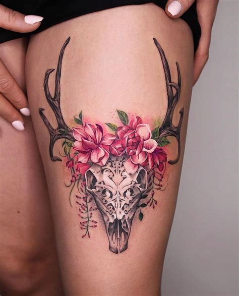 101 charming floral tattoo ideas. Carved Skull & Pink Flowers