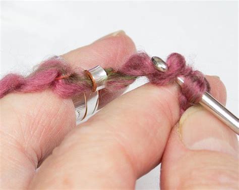 Lay a strand of yarn in any of the channels, and snap the lid closed to secure. The original knitting rings 2 loop yarn guide rings | Etsy ...