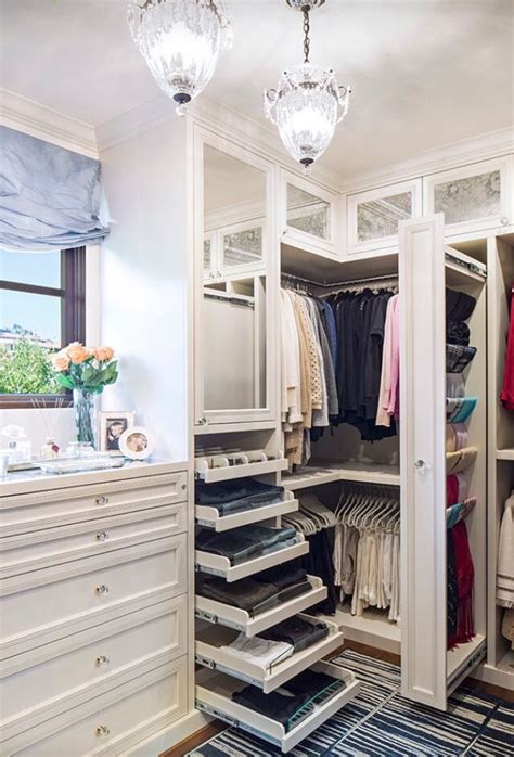 21 best small walk in closet storage ideas for bedrooms. Clever storage in this sleek and cleanly designed walk in ...