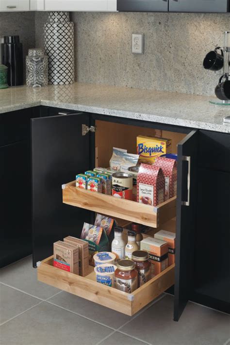 The base pantry pullout cabinet is perfect for point of use storage of spices, oils and other kitchen necessities. Base Cabinet with Roll Trays - Diamond Cabinetry