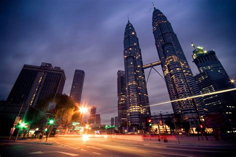What time is it in kuala lumpur? Night time view of Petronas Twin Towers in Kuala Lumpur ...