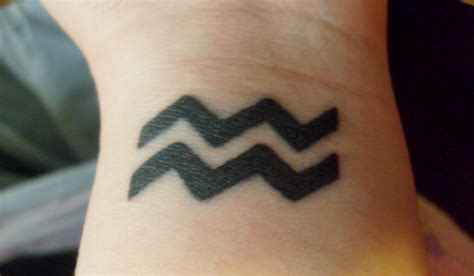 Those searching for something simple but creative opt for this those ladies wanting a geometric design but a simplistic tattoo will appreciate this minimalist style. 38 Beautiful Aquarius Tattoos Design - Desiznworld