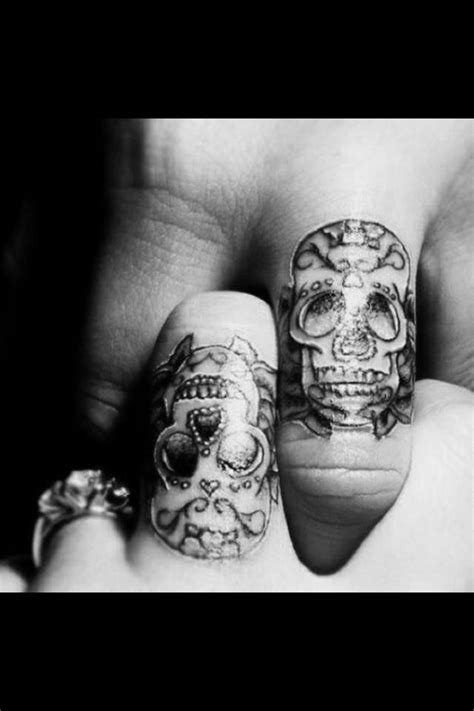 Tattoo parlors often carry a lubricant tattoos are painful, especially on sensitive areas like the finger. Matching figure tattoos (With images) | Skull finger ...