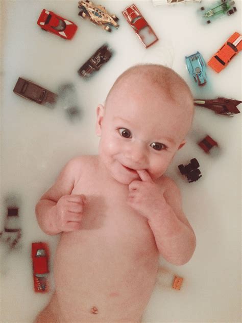 Before giving your baby her first tub bath, wait until her umbilical cord falls off, which usually happens ten to 14 days after birth. Baby boy 6 month milk bath. Breastfeeding milestone ...