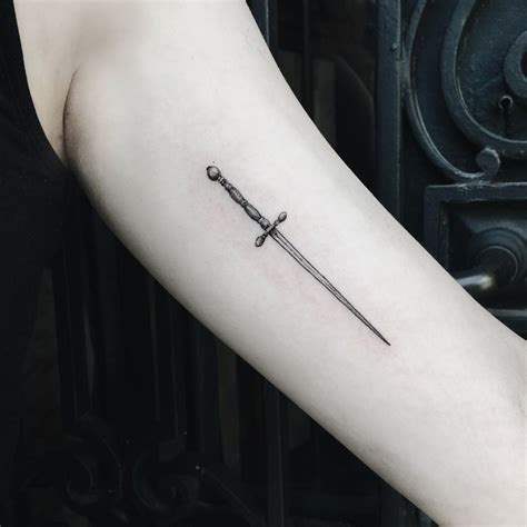 The popular christian cross tattoo provides an interesting design. birdkostudies: "won't go down without a fight 🗡 " | Sword ...