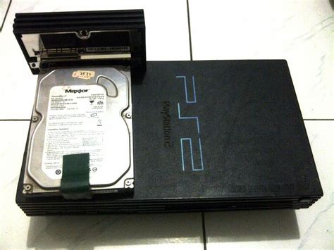 Sekarang kita jalankan cvd ulaunch yang kita bikin tadi didalam mesin ps2,dan jangan lupa pasang mmc pada slot 1,.dan flashdisk pada. Cara Pasang Hardisk Pada PS2 Slim | Toko Pintar