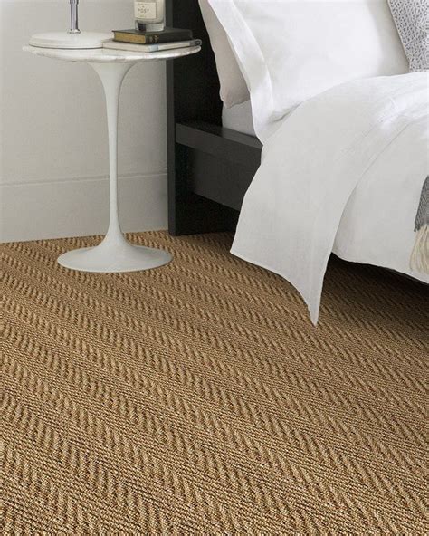 The natural appeal of seagrass stems from its shades of beige, brown and. Seagrass Herringbone Carpet | Natural carpet, Alternative ...