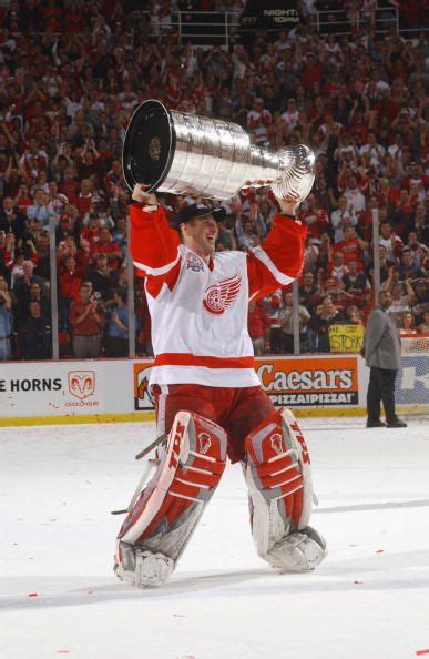 Widely regarded as one of the greatest goaltenders of all time. Dominik Hasek hoisting Lords Stanley Cup for the first ...