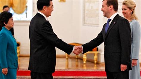 Russian president dimitry medvedev in paris motorcade with motorcycle escort. Chinese president greeted with pomp and pageantry in ...