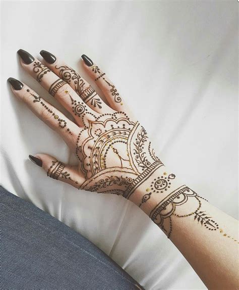 Although most henna tattoos feature the very recognizable scrolling designs, there are many other symbols that can be seen in this style of art. TRIBAL HENNA