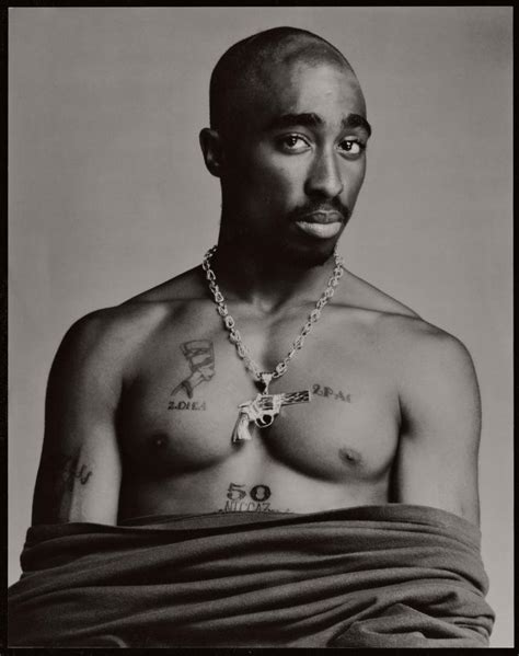 Born in new york city, tupac grew up primarily in harlem. The Sad Story Behind One of the Most Striking Images of ...