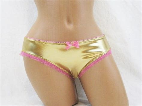 Katy mixon in golden spandex dress. Gold metallic spandex panties with pink trim lingerie ...