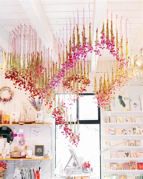 To begin, you'll need string and something to hang your flowers from such as a twig, ceiling hook, or clothing hanger. Dried hanging flower installation by artist Ashley Renuart ...