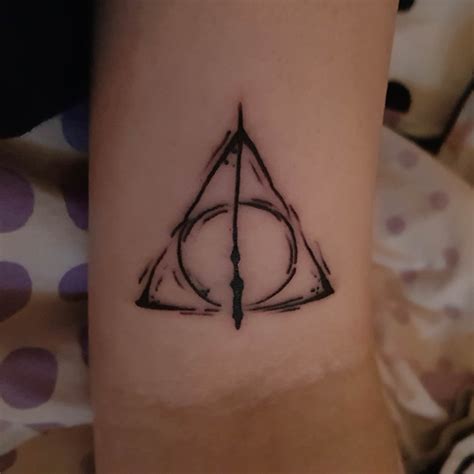 Providing beautiful watercolor tattoo art. My Deathly Hallows tattoo by James Richardson at Northern ...