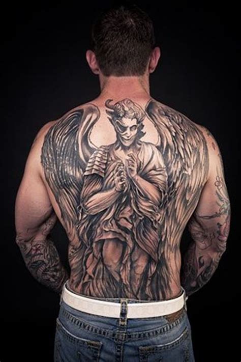 A demon tattoo represents evil and the underlying demonic forces that connect people. demon tattoo on back | Tatuagens nas costas para homens ...