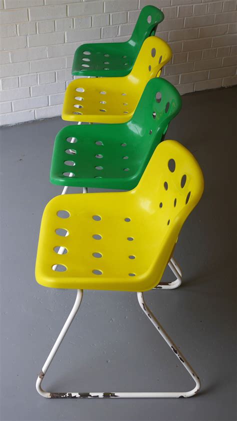 When did robin day create the cube sofa? Set of 4 Hille "Polo" chairs in polypropylene, Robin DAY ...