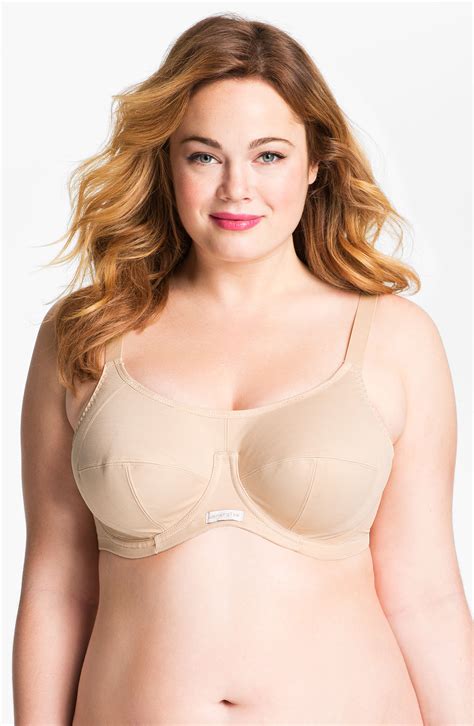 This sports bra has a hook and clasp back closure like a normal bra, so it is very easy to get on and off, it offers full. Elomi Energise Sports Bra Dd Cup Up in Beige (nude) | Lyst