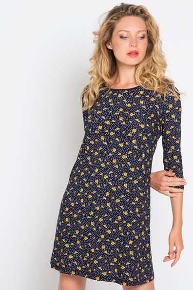 Robe courte femme moulante sans manches clubbing été sexy. Petite robe fleurie pour femme