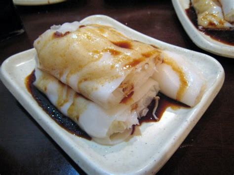 For english subtitles, click the captions button in the right corner of the video (2nd button. vegetarian dim sum rice roll | Krista | Flickr