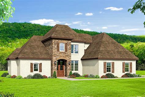 Cedar shake and stacked stone envelop this gorgeous cottage. 4-Bedroom European House Plan with Bonus Room and First ...