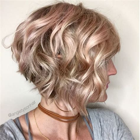 At the back of the head, locks get thick and voluminous due to their shortness, and at the front, long locks demand. wavy inverted bob with bangs - Google Search | Wavy bob ...