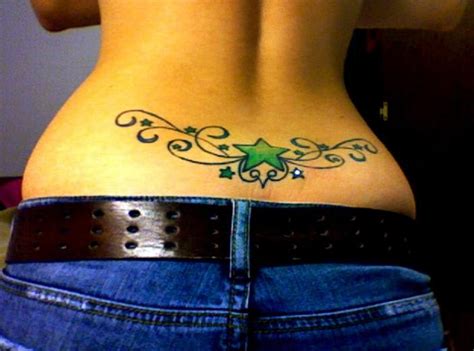 The lower back tattoo design below looks cute with the combination of brown and black colours with the bold lines making the artwork quite distinct and elegant. Lower Back Tattoos