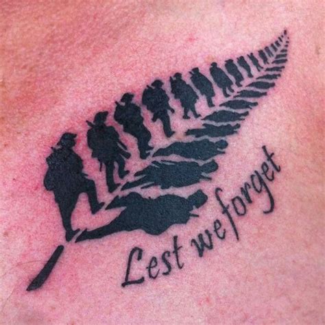 Tattoo poppy memorial designs military tattoos war lest forget remembrance flower sleeve army shoulder tribute mens multicolored ink arm lettering. Lest we forget in remembrance soldier tattoo in Fern leaf ...