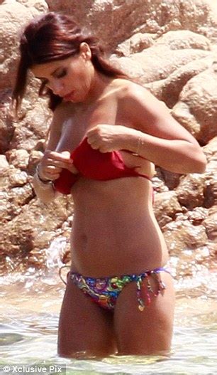 Looking for more camel toe? Cesc Fabregas and his girlfriend Daniella slip into their ...