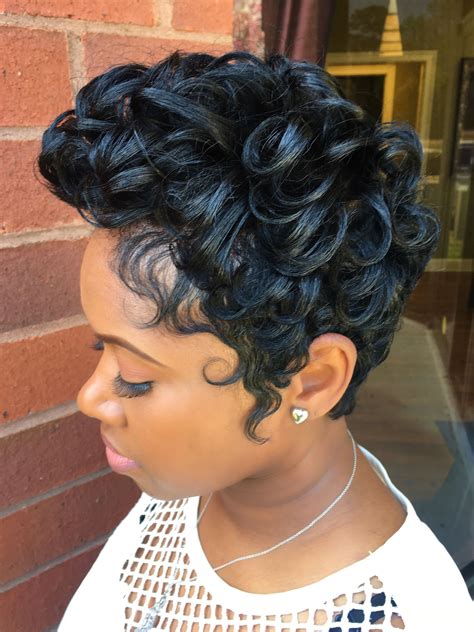 When picking out a style for a round face, you want one that thins out the roundness of the face while accentuating the eyes, lips, and cheekbones. NouriTress Salon & Hair Clinic Photos - Fayetteville, GA image by NouriTress Hair Products & Sal ...