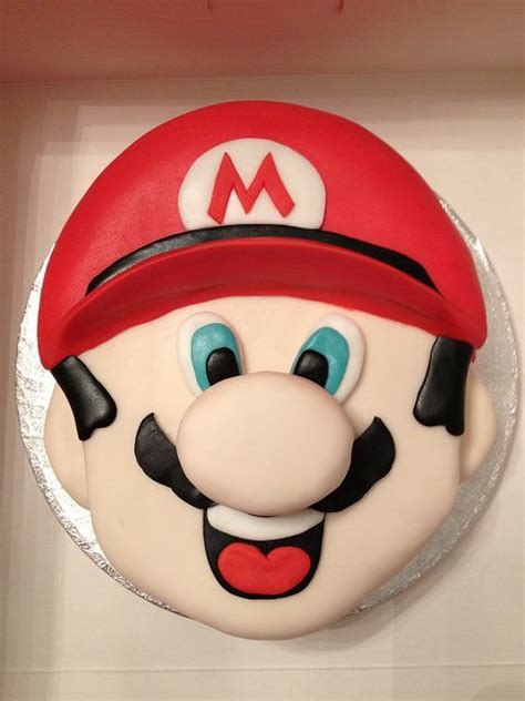 The theme revolves around players are looking for stars on a giant birthday cake. Super Mario | Mario birthday cake, Mario cake, Mario bros cake