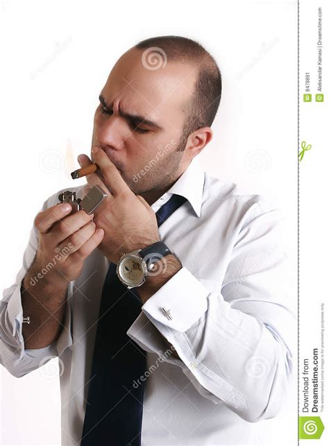 Once the tip of your cigarette glows, extinguish the flame of your lighter or match. Man Light A Cigarette Stock Image - Image: 8478891