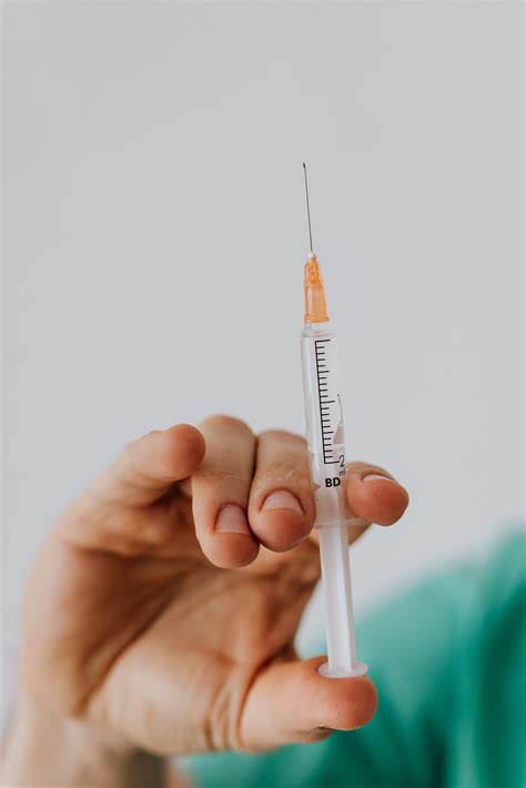 Any vaccine trial should include regular antigen testing every three days to test contagiousness to pick up early signs of infection and pcr testing once a week to confirm infection the greatest fear people have is dying from this disease. Person Holding A Vaccine · Free Stock Photo