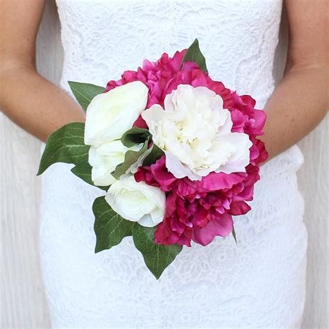 Learn how to make your own wedding bouquets and matching boutonnieres with this simple diy from diy peony bouquet. Beautiful, Budget Friendly Wedding Flowers at Afloral.com ...