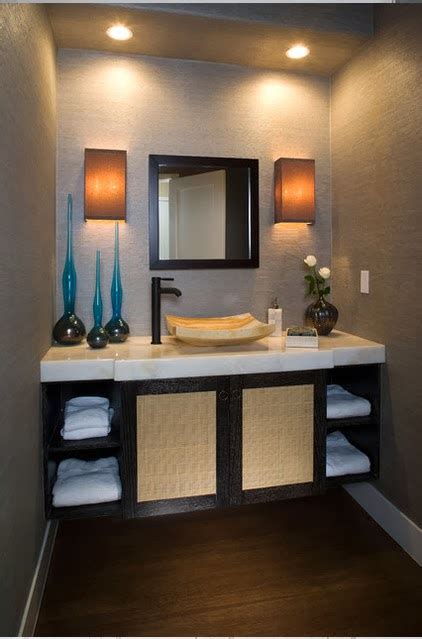 Brass light fixtures pull the entire style together. Simplifying Remodeling: A Crash Course in Bathroom Faucet ...