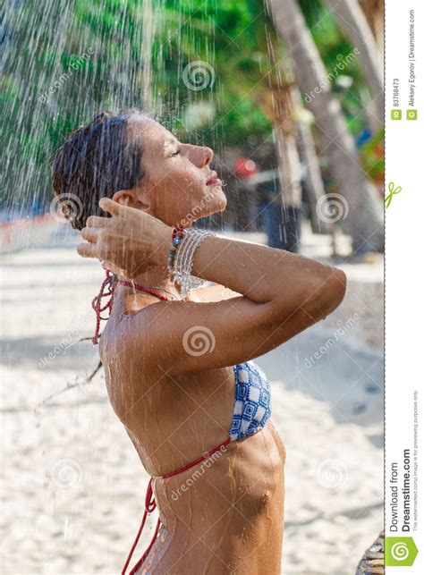 She is usually seen sitting on top of the speakers, bopping her head to the tempo of the music. Attractive Woman Under The Shower Stock Image - Image of ...