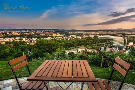 The western carpathians rise above settlement areas in the valleys. Panoramic Cetățuie, Cluj - Rezervă o masă online ...