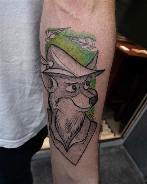 Cartoon tattoos are incredibly popular with all people of all ages. Robin Hood Tattoo by Karan Sarin | Disney tattoos, Tattoos ...