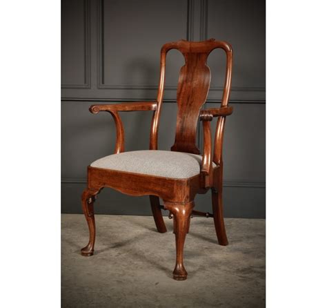 Queen anne style arm chairs feature the curved spindly legs, curved backs, and cushioned seats. Pair of Quality Queen Anne Style Armchairs