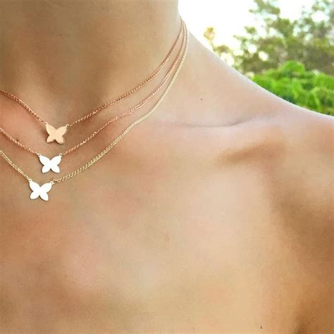 Check spelling or type a new query. 14k Gold White Rhodium Floating Butterfly Necklace